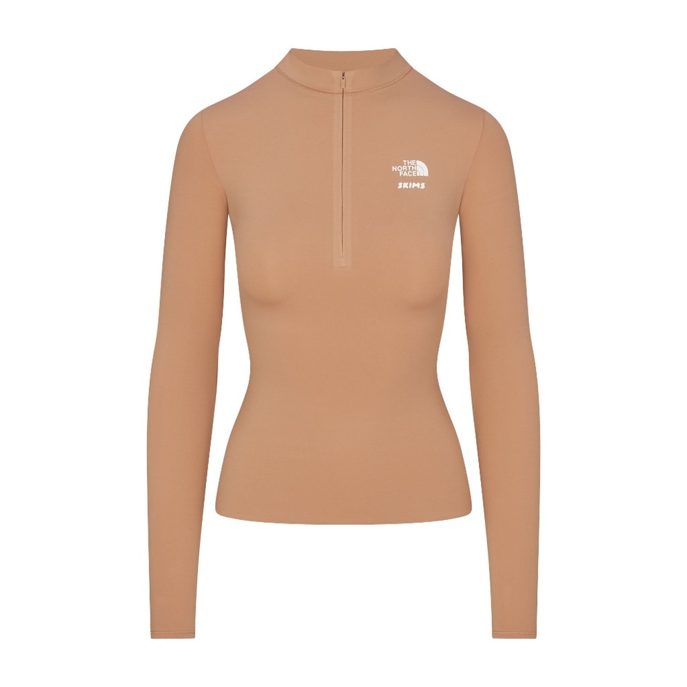 The Northface X Skims Refina Ochre Long Sleeve Top Size medium.
